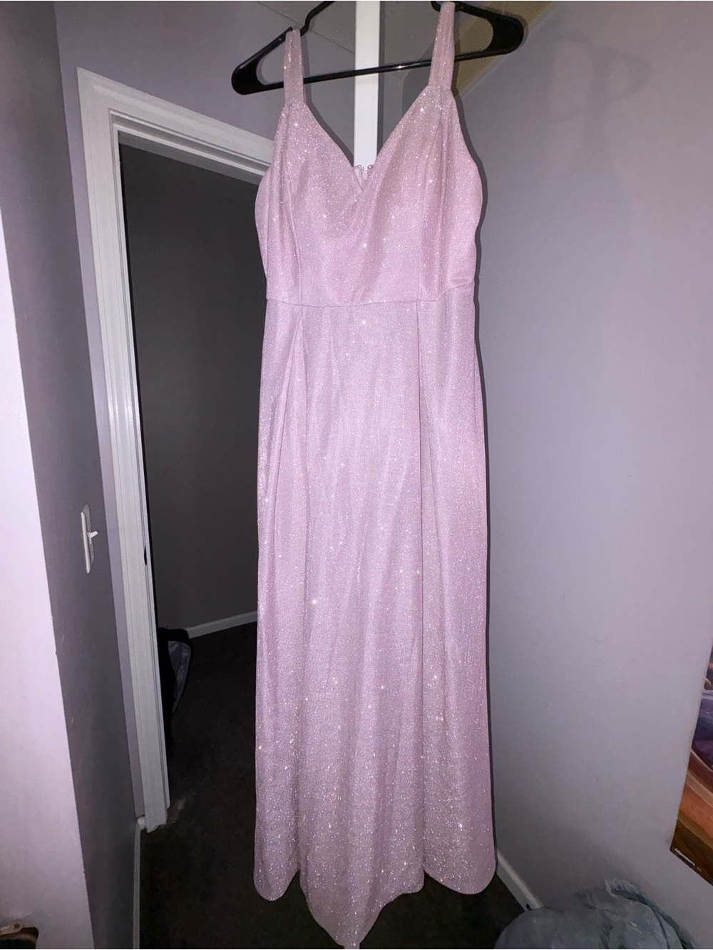 Purple sparkling prom dress with a pink floral detail panel in the back.